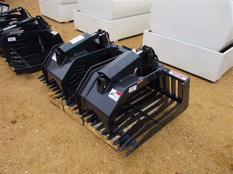 stout skid steer equipment|best skid steer brush grapple.